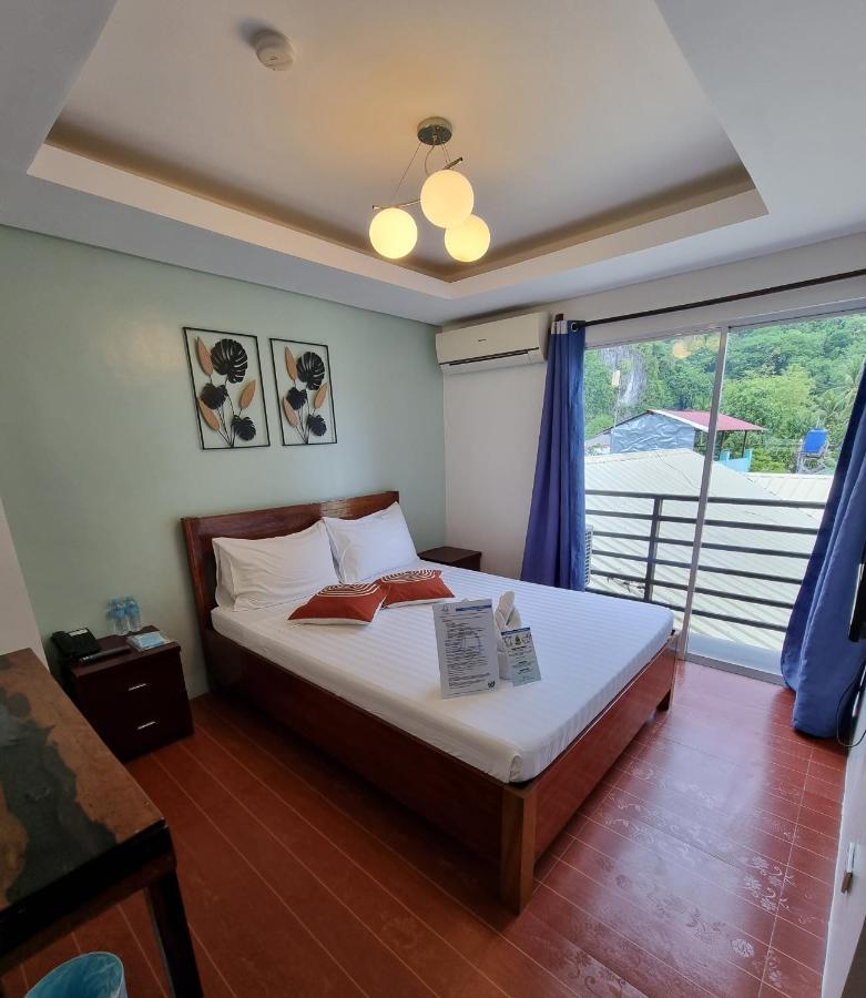 Aqua Travel Lodge เอลนิโด ภายนอก รูปภาพ